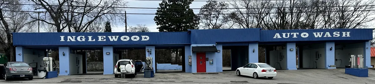 Full view of the blue Inglewood Autowash storefront and its business signage on Gallatin Pike.